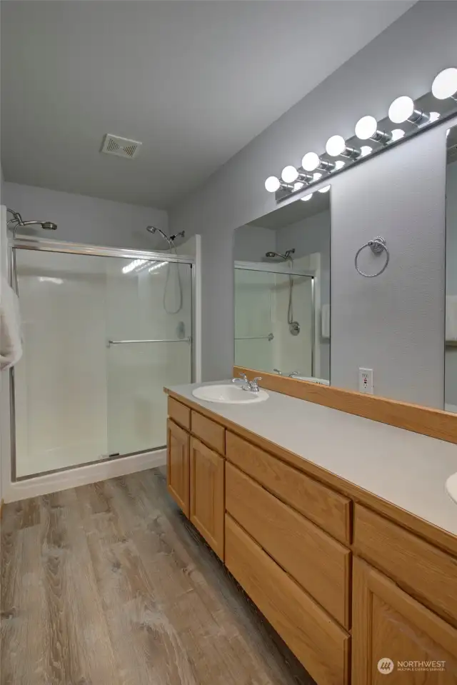 Spacious double headed shower rounds out the primary bath.