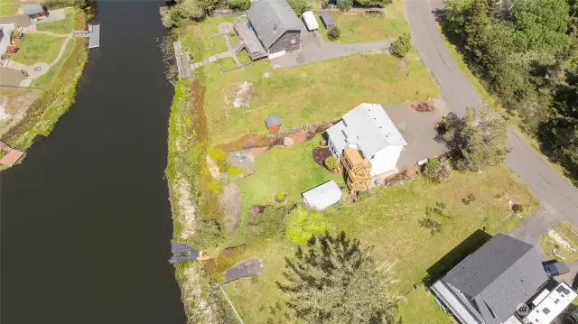 Look at how big that back yard is!  And yes, the dock at the corner of the property is yours!