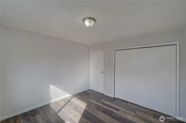 2nd bedroom to left of primary, almost identical in size