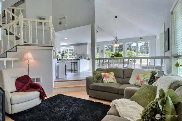 Sitting area off the kitchen with fireplace. Curl up with a book and cup of your favorite beverage.