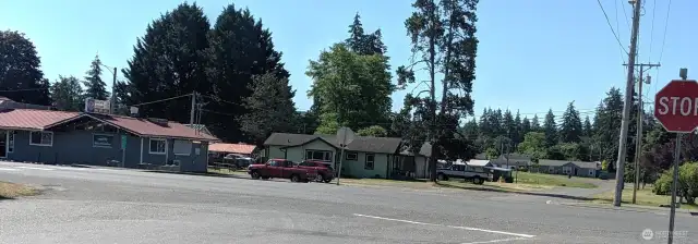 From Hwy 12 down cross street toward duplex (see carport behind the pickup truck on right side of the picture)