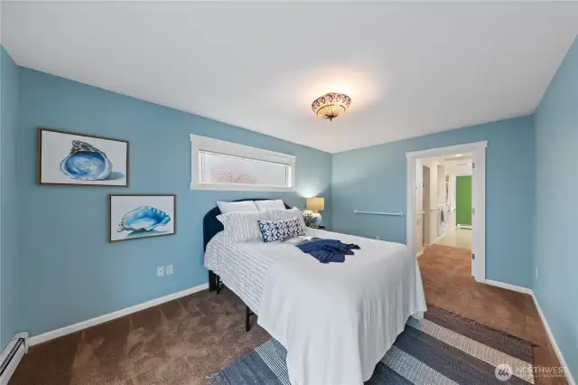 Main floor primary bedroom with all the bells and whistles!