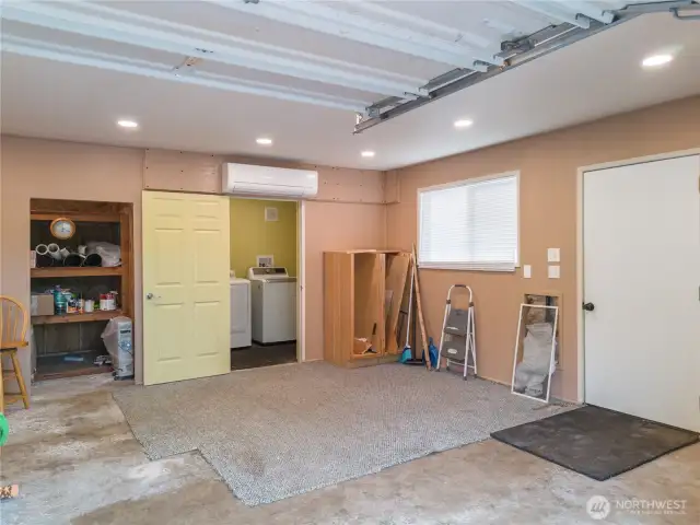 Inside the finished garage - mini-split, laundry, closet.