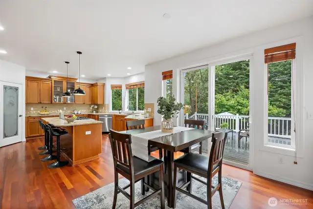 The Brazilian cherry hardwoods extend through the formal dining room, butlers pantry, kitchen and eating nook.