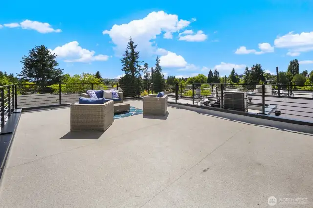 Rooftop expanse ready for lounge furniture, planters, and epic summer sunsets. Photos are of model home 8825, finishes and floorplan may vary.