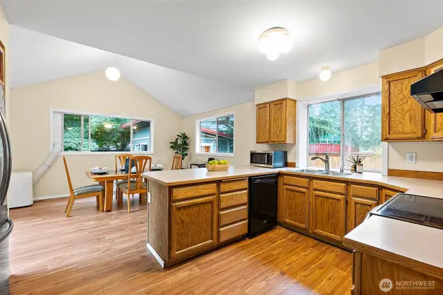 Open flow here, vaulted ceilings, fresh paint!