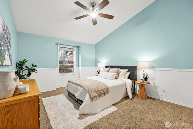 Principal suite is a lovely pop of soft teal revealing a nice retreat space