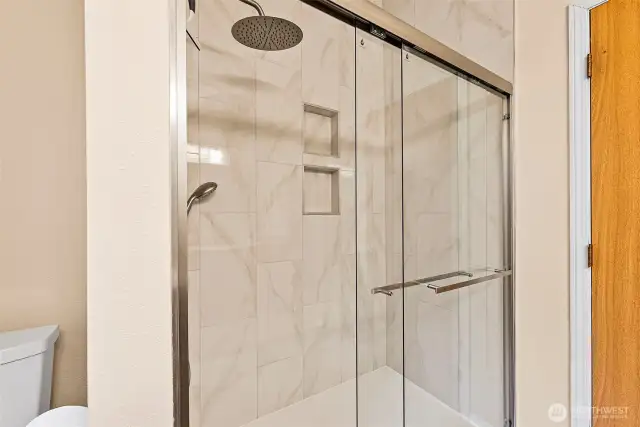 WAIT -- brand new walk-in fully tiled shower too? Yes it is!