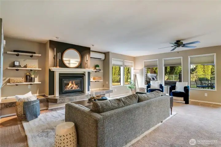 Open and opulent spaces, built ins, and designer touches throughout this home, all bordered by greenspace and golf course views.