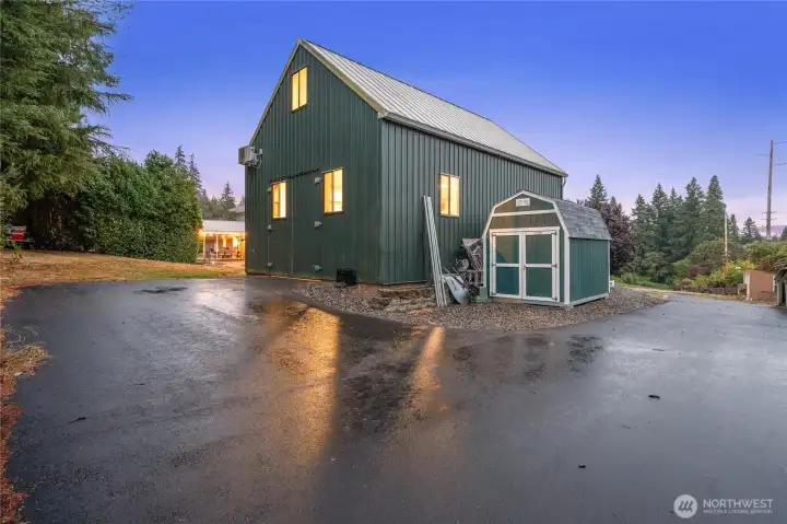 shop w extra pavement for multiple cars, RV's, boats and toys.