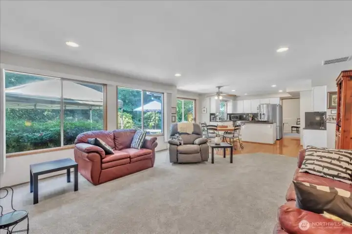Spacious family room flowing into the kitchen for easy living and entertaining.