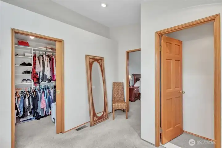 The primary bath offers a soaking tub, walk-in shower, dual vanity, private toilet, and a spacious walk-in closet.”