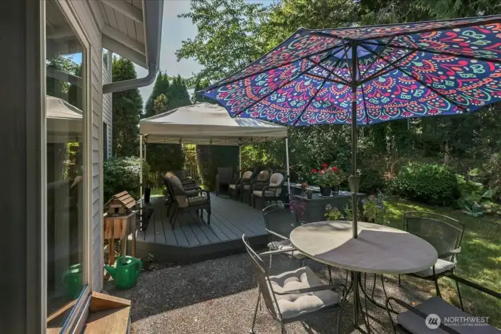 Relax in your private, fully fenced, low-maintenance backyard featuring a brand-new Trex deck—perfect for entertaining.”