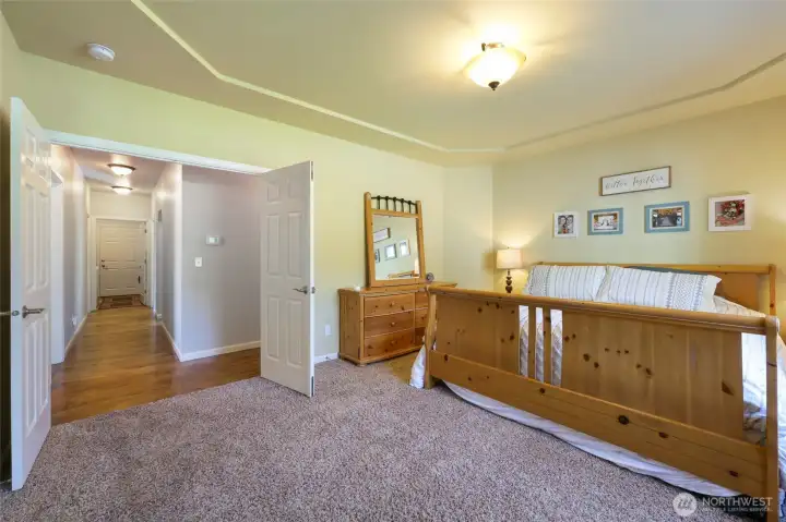 Double doors into the primary bedroom