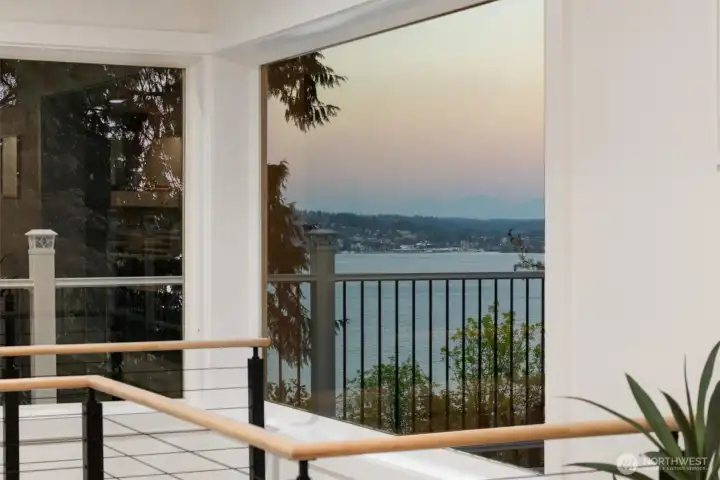 Serene lake views can be enjoyed from inside the home