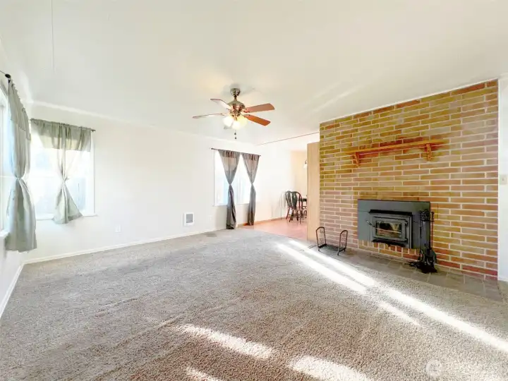 The wood burning stove is a warm and comfortable feel to the home.