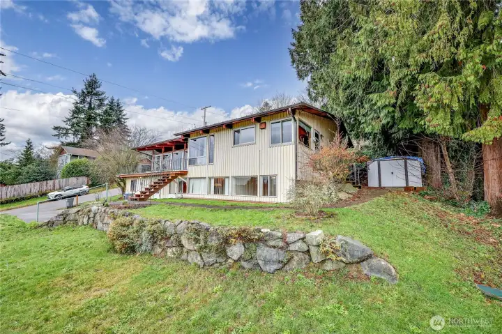 The front of this wondeful home sits on a large corner lot.