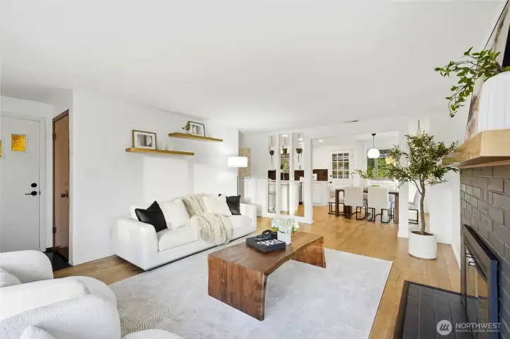 Open-concept living and dining space with abundant natural light in this Scenic Hill home.