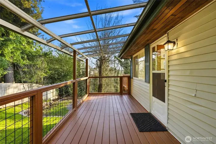 Covered deck space for year-round outdoor living in this Scenic Hill Kent home.