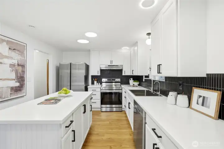 Functional galley-style kitchen with ample counter space and storage.