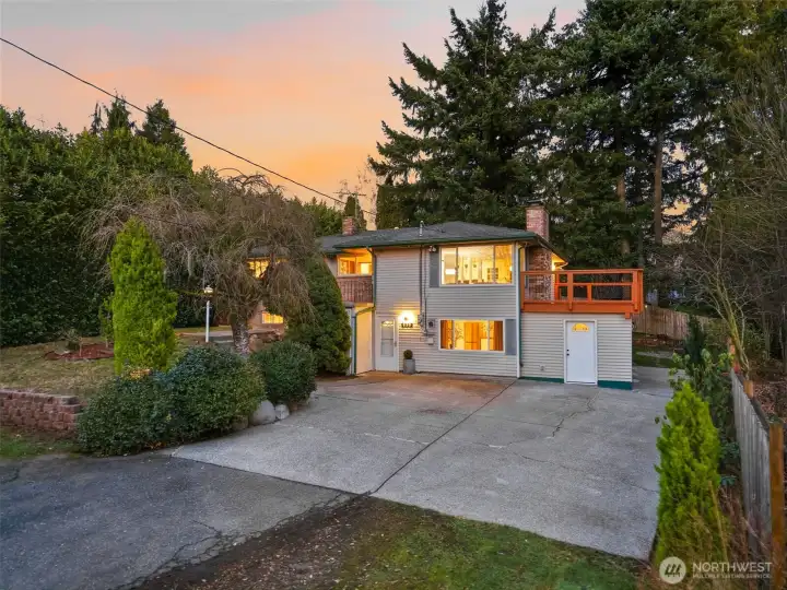 Long driveway and private setting provide extra parking and curb appeal in this Kent Washington home.