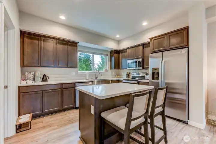 Beautiful cabinetry with plenty of counterspace.  All appliances stay!