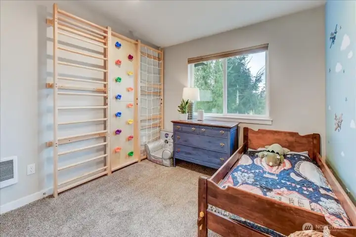 One of the bedrooms overlooks backyard. Play structure is negotiable and has other sections not pictured.