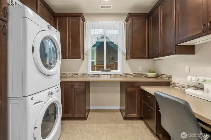 Functional Laundry Room with Work Area.