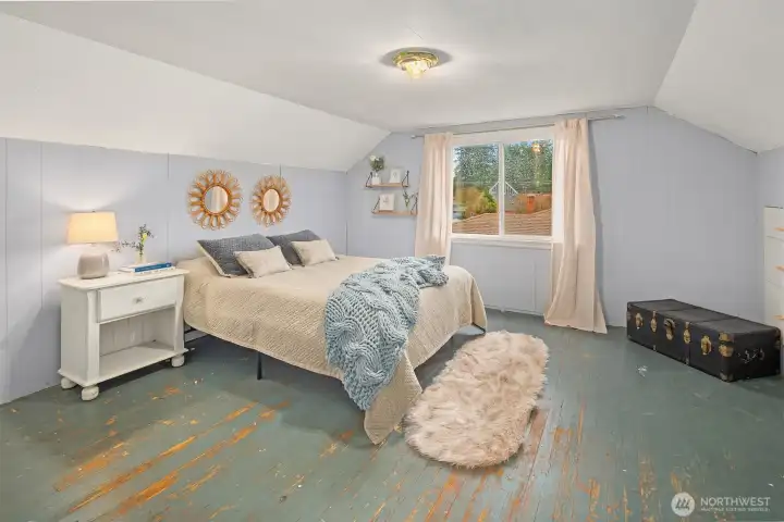 This is one of the upstairs bedrooms featured and it is the largest of the two.