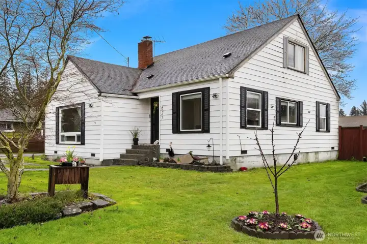 The home's front elevation by day.