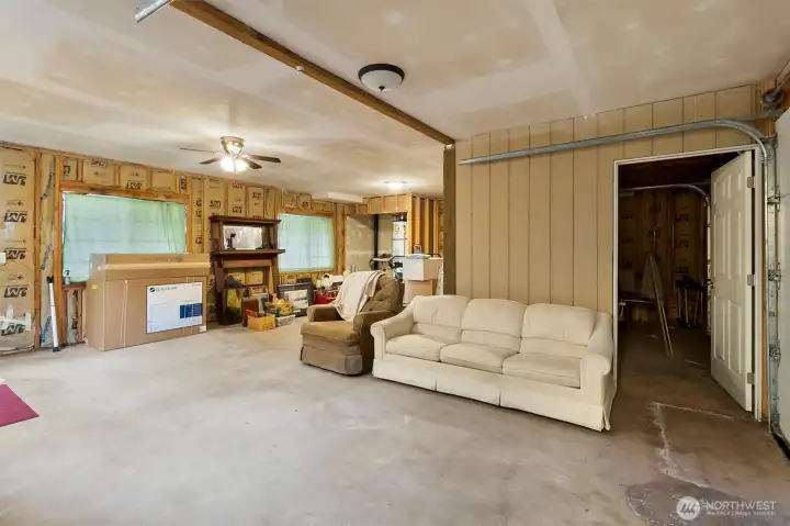 Additional storage space with full garage door access