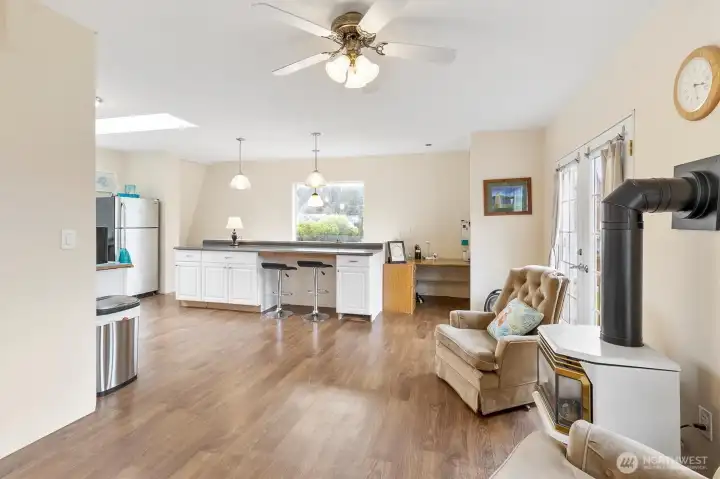 view from hallway toward office space above stairs