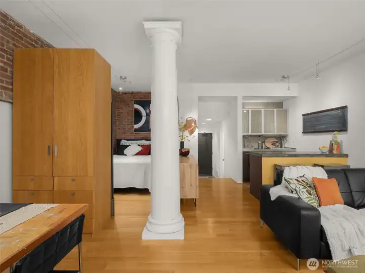 Stepping into your unit from the patio- you'll be wowed as you take it all in! Rich in history, textures, and overall cool factor!