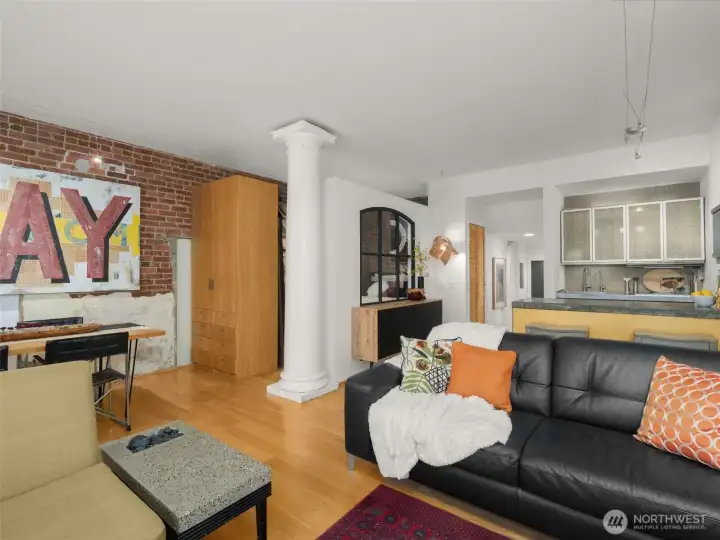 Wall and storage cabinets create some division between your living and sleeping areas. The column you see, was salvaged from the Governor's Mansion in Olympia, during exterior renovations in the 1970's.