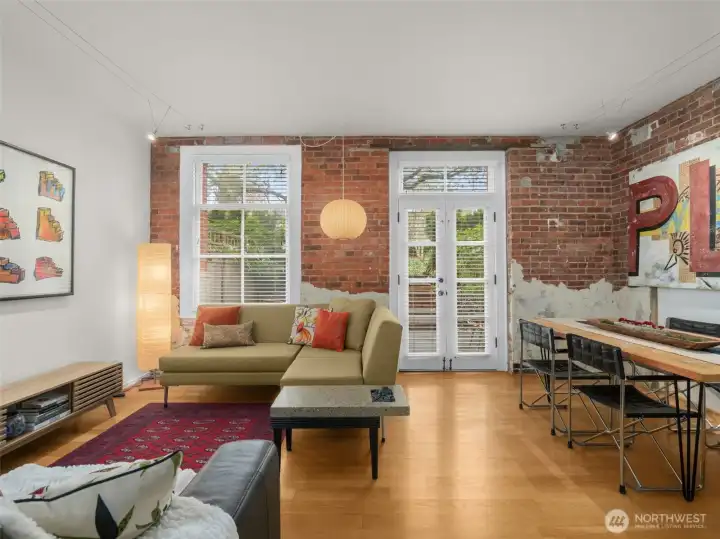 Looking towards the patio doors- west facing unit brings beautiful natural light, both inside and out