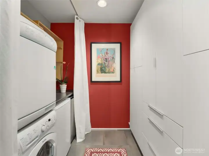 Just off the main entry, you'll find your washer/dryer, a freezer, another refrigerator, and TONS of storage!