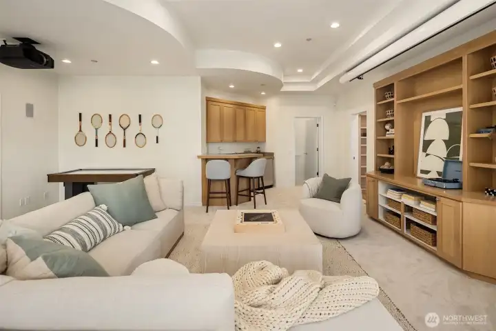 Entertainment Hub: Cinema-style media room designed for movie nights and game days. Projector and screen stays with the home!