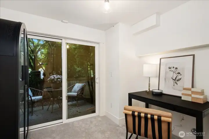 The flexible entry-level bedroom adapts to your life—whether you need a quiet professional home office, a dedicated workout studio, or a welcoming space for guests.