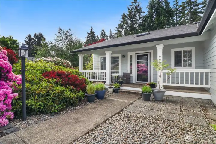Inviting entry with covered front porch.