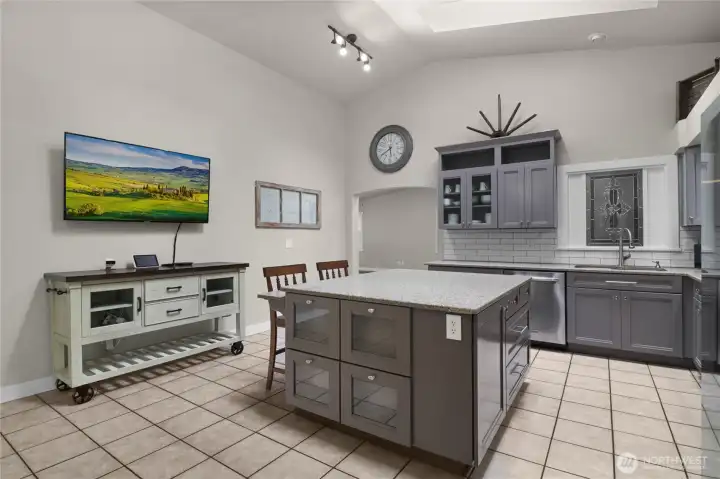 Beautifully refinished cabinets offer plenty of storage.
