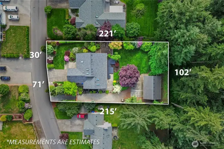 The large lot offers privacy and functionality.