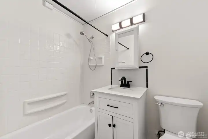 Unit 2 - Updated and clean full bathroom. Unit 2 - Updated and clean full bathroom.