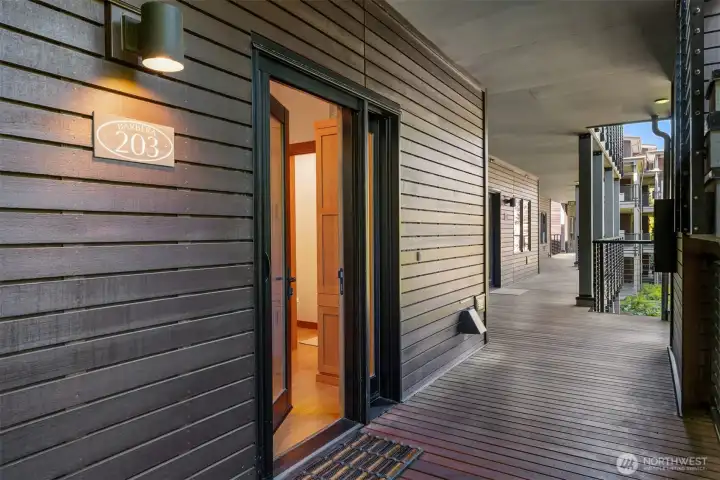 Outdoor covered entrance with direct elevator access to the garage. Outdoor covered entrance with direct elevator access to the garage.