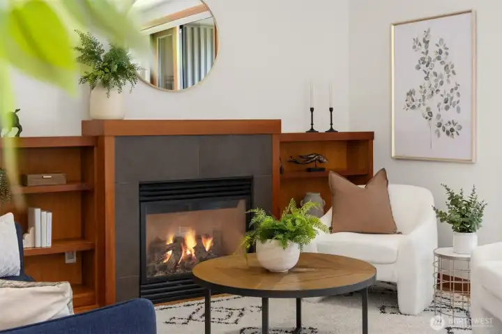 The propane fireplace centers the great room and is framed by tasteful built-in shelving. The propane fireplace centers the great room and is framed by tasteful built-in shelving.