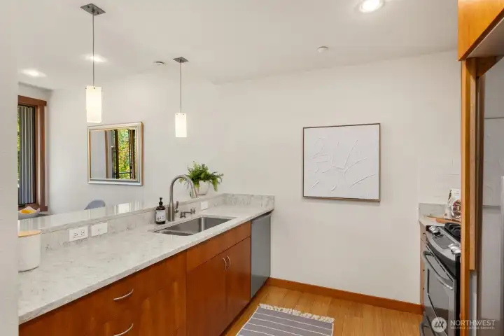 Stainless steel appliances include the dual fuel stove/range. Stainless steel appliances include the dual fuel stove/range.