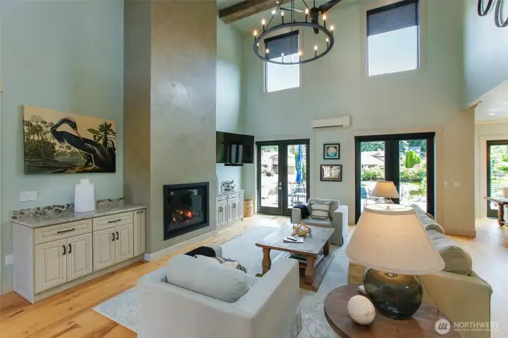 Hickory floors with porcelain finish. Venetian fireplace surround. Heat and AC by minisplit. Fireplace also heats the home well. Hickory floors with porcelain finish. Venetian fireplace surround. Heat and AC by minisplit. Fireplace also heats the home well.