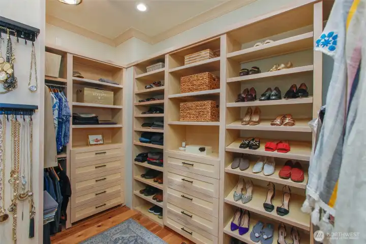 Primary walk-in closet. Primary walk-in closet.