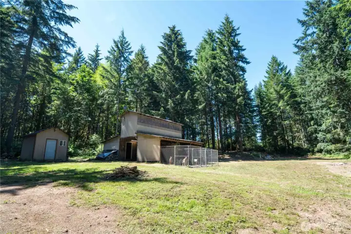 view of the land, barn, and shed