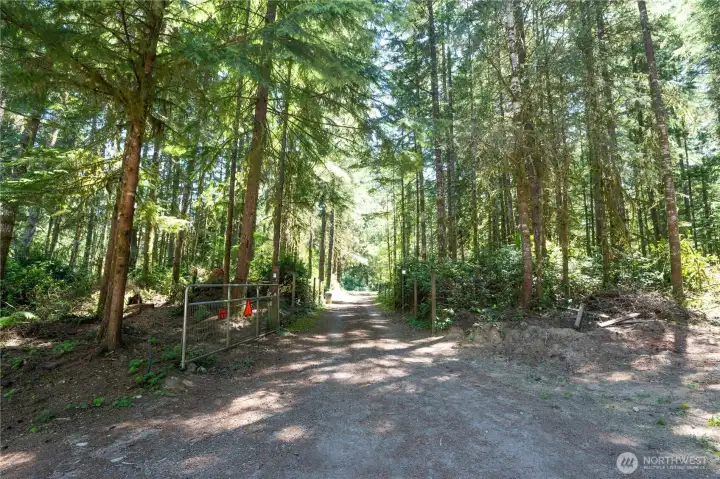 view of the gate to the road that leads to the main road