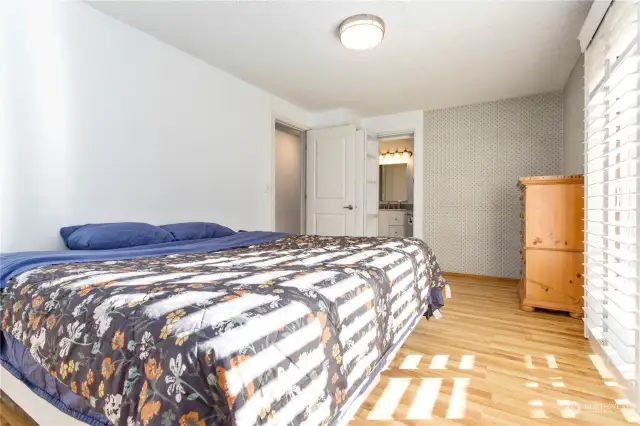 Primary Bedroom and Entrance to Bathroom